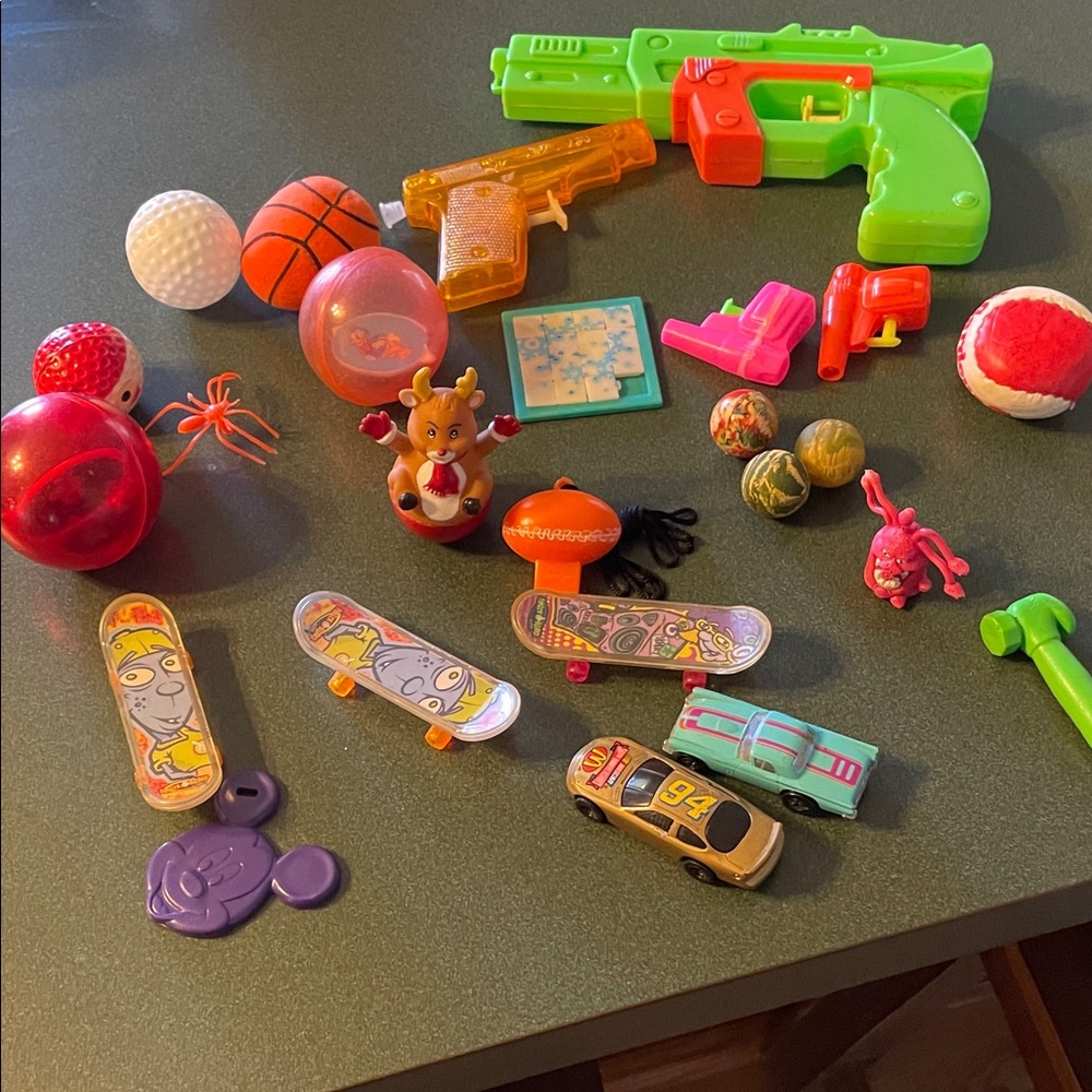 Vintage/ mixed toys, multi ,balls,water guns,finger boards, cars and much more
